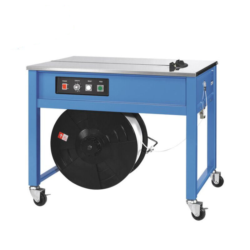 Blue PSM1412-IC3A semi-automatic tabletop strapping machine with stainless steel work surface, control panel, strap dispenser, and caster wheels.